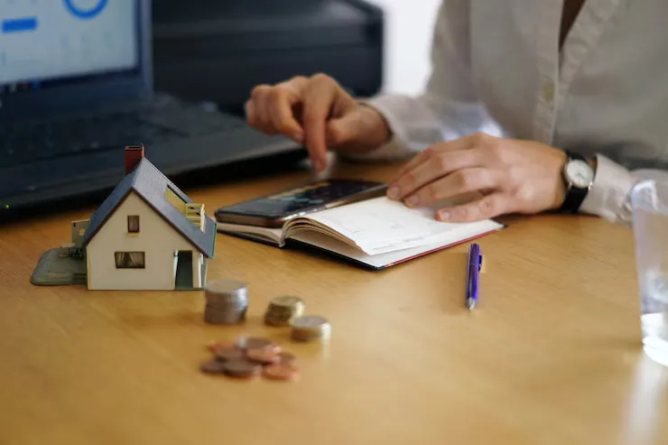closeup-shot-person-thinking-buying-selling-house_181624-24672