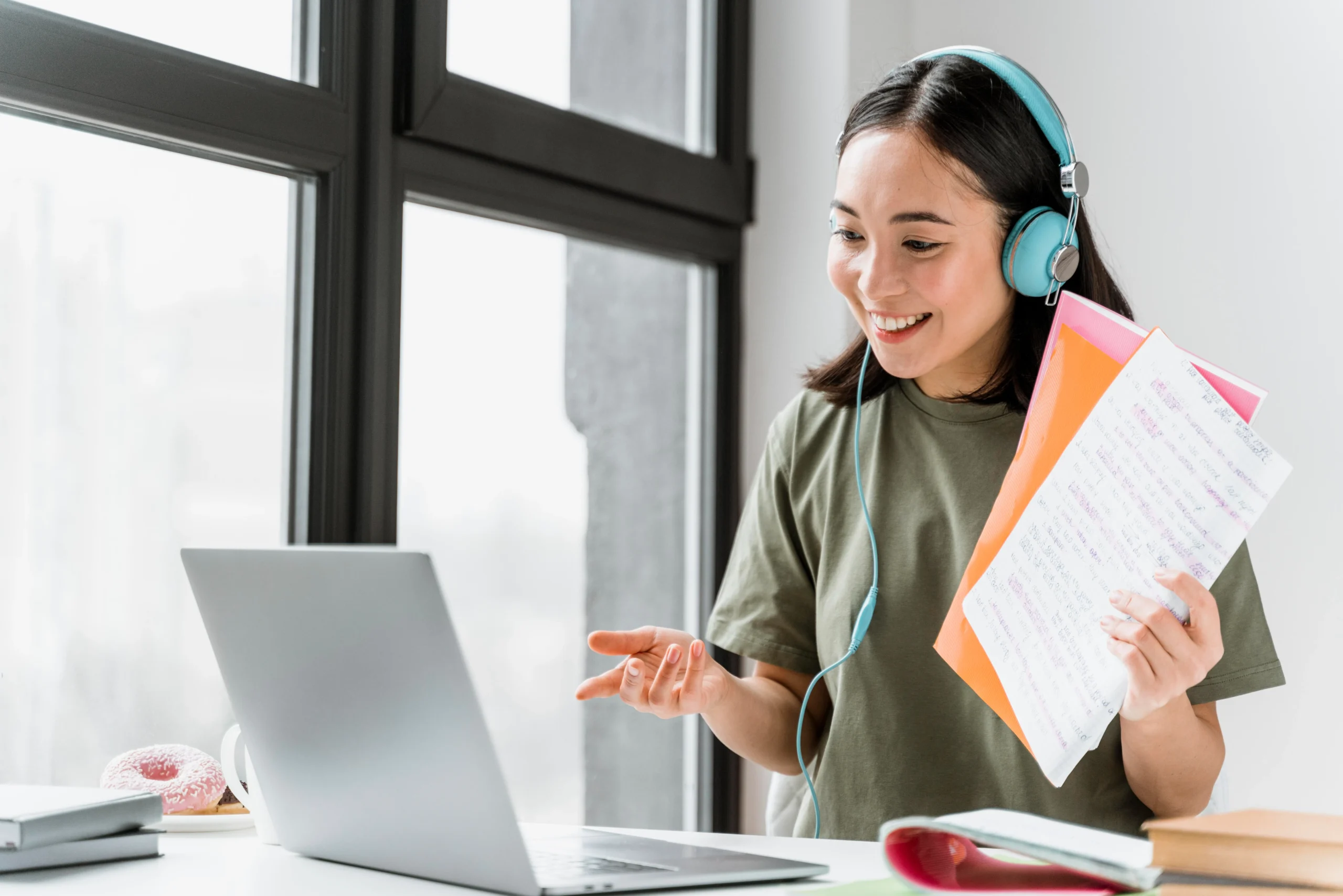 woman-with-headphones-having-video-call-laptop